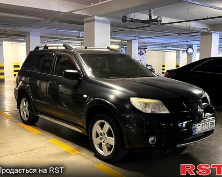 Черный Мицубиси Аутлендер, объемом двигателя 2.4 л и пробегом 260 тыс. км за 8100 $, фото 2 на Automoto.ua