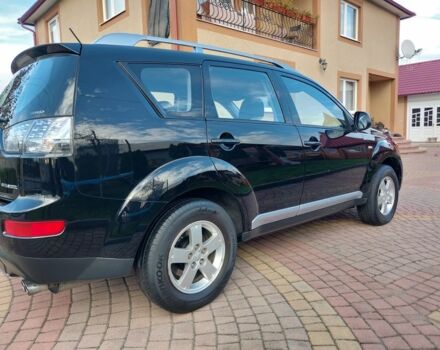 Черный Мицубиси Аутлендер, объемом двигателя 2 л и пробегом 249 тыс. км за 8750 $, фото 5 на Automoto.ua