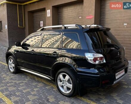 Черный Мицубиси Аутлендер, объемом двигателя 2 л и пробегом 270 тыс. км за 7199 $, фото 14 на Automoto.ua