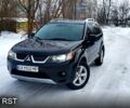 Чорний Міцубісі Аутлендер, об'ємом двигуна 3 л та пробігом 238 тис. км за 9600 $, фото 1 на Automoto.ua