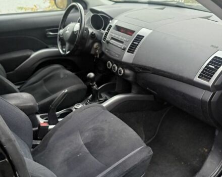 Черный Мицубиси Аутлендер, объемом двигателя 2 л и пробегом 226 тыс. км за 4700 $, фото 6 на Automoto.ua