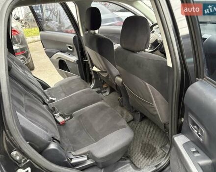 Черный Мицубиси Аутлендер, объемом двигателя 2.4 л и пробегом 185 тыс. км за 7900 $, фото 10 на Automoto.ua