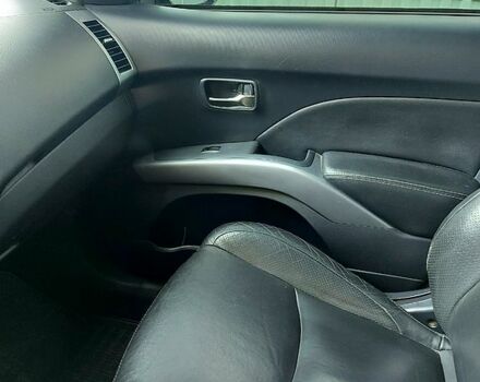 Чорний Міцубісі Аутлендер, об'ємом двигуна 3 л та пробігом 143 тис. км за 9500 $, фото 8 на Automoto.ua