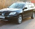 Черный Мицубиси Аутлендер, объемом двигателя 2 л и пробегом 190 тыс. км за 6900 $, фото 21 на Automoto.ua