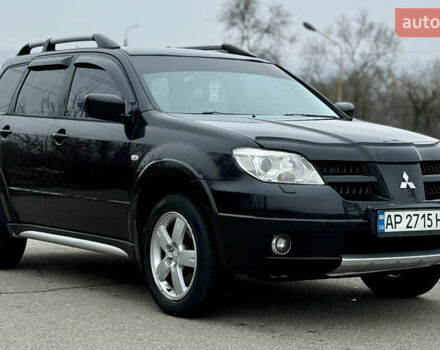 Черный Мицубиси Аутлендер, объемом двигателя 2.4 л и пробегом 245 тыс. км за 6500 $, фото 4 на Automoto.ua