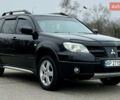 Черный Мицубиси Аутлендер, объемом двигателя 2.4 л и пробегом 245 тыс. км за 6500 $, фото 4 на Automoto.ua