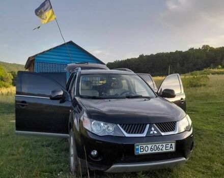 Черный Мицубиси Аутлендер, объемом двигателя 2.36 л и пробегом 203 тыс. км за 9200 $, фото 7 на Automoto.ua