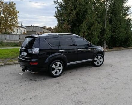 Черный Мицубиси Аутлендер, объемом двигателя 2.2 л и пробегом 200 тыс. км за 9500 $, фото 3 на Automoto.ua