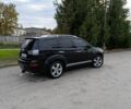 Черный Мицубиси Аутлендер, объемом двигателя 2.2 л и пробегом 200 тыс. км за 9500 $, фото 3 на Automoto.ua