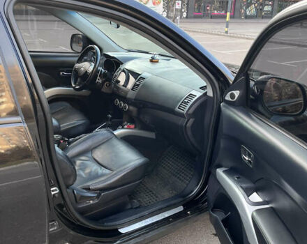 Черный Мицубиси Аутлендер, объемом двигателя 2.4 л и пробегом 237 тыс. км за 5000 $, фото 15 на Automoto.ua