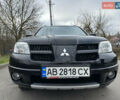 Чорний Міцубісі Аутлендер, об'ємом двигуна 2 л та пробігом 118 тис. км за 8100 $, фото 2 на Automoto.ua