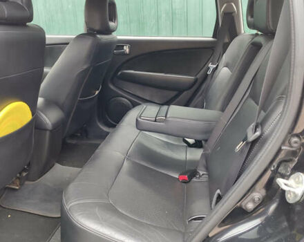 Чорний Міцубісі Аутлендер, об'ємом двигуна 2.4 л та пробігом 200 тис. км за 6790 $, фото 9 на Automoto.ua