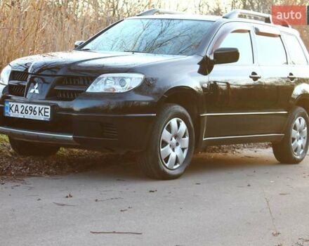 Черный Мицубиси Аутлендер, объемом двигателя 2 л и пробегом 190 тыс. км за 6900 $, фото 15 на Automoto.ua