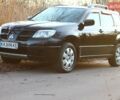 Черный Мицубиси Аутлендер, объемом двигателя 2 л и пробегом 190 тыс. км за 6900 $, фото 15 на Automoto.ua