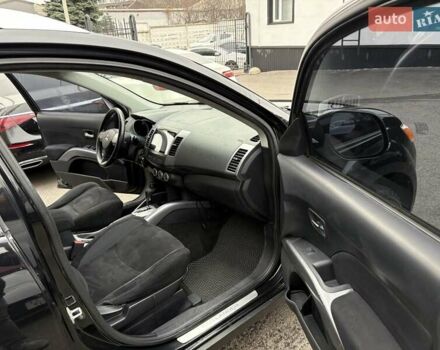 Черный Мицубиси Аутлендер, объемом двигателя 2.4 л и пробегом 185 тыс. км за 7900 $, фото 12 на Automoto.ua