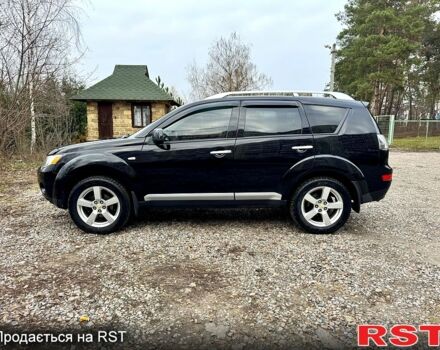 Черный Мицубиси Аутлендер, объемом двигателя 2.4 л и пробегом 229 тыс. км за 9790 $, фото 3 на Automoto.ua