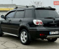Черный Мицубиси Аутлендер, объемом двигателя 2.4 л и пробегом 245 тыс. км за 6500 $, фото 7 на Automoto.ua