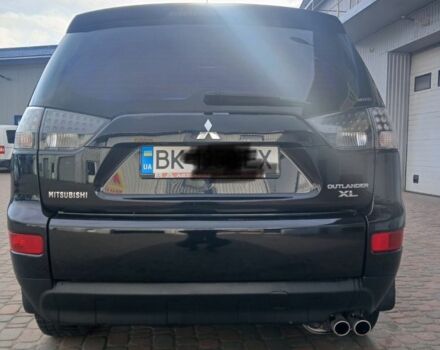 Чорний Міцубісі Аутлендер, об'ємом двигуна 3 л та пробігом 300 тис. км за 9600 $, фото 7 на Automoto.ua