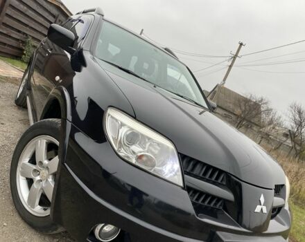 Черный Мицубиси Аутлендер, объемом двигателя 2.4 л и пробегом 178 тыс. км за 6900 $, фото 6 на Automoto.ua