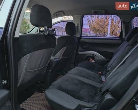 Черный Мицубиси Аутлендер, объемом двигателя 2.36 л и пробегом 192 тыс. км за 8800 $, фото 11 на Automoto.ua