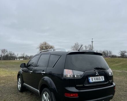 Черный Мицубиси Аутлендер, объемом двигателя 2.4 л и пробегом 230 тыс. км за 8800 $, фото 3 на Automoto.ua