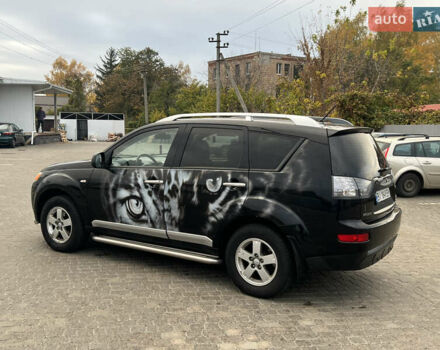 Черный Мицубиси Аутлендер, объемом двигателя 2.4 л и пробегом 230 тыс. км за 6650 $, фото 8 на Automoto.ua
