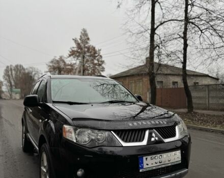 Черный Мицубиси Аутлендер, объемом двигателя 2 л и пробегом 377 тыс. км за 5200 $, фото 7 на Automoto.ua