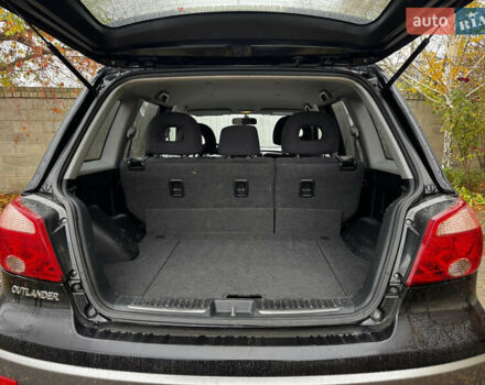 Чорний Міцубісі Аутлендер, об'ємом двигуна 2 л та пробігом 254 тис. км за 7499 $, фото 22 на Automoto.ua