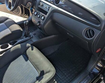 Черный Мицубиси Аутлендер, объемом двигателя 2 л и пробегом 189 тыс. км за 7100 $, фото 9 на Automoto.ua