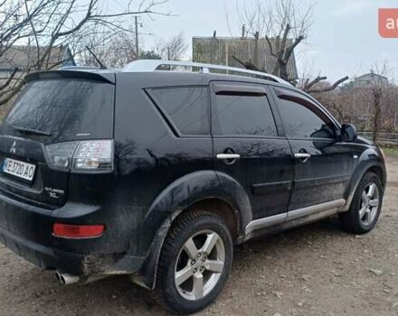 Черный Мицубиси Аутлендер, объемом двигателя 3 л и пробегом 152 тыс. км за 8700 $, фото 5 на Automoto.ua