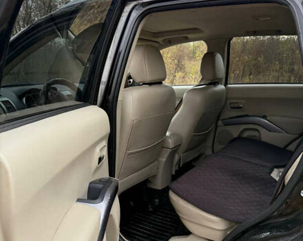 Черный Мицубиси Аутлендер, объемом двигателя 2.18 л и пробегом 233 тыс. км за 9600 $, фото 6 на Automoto.ua