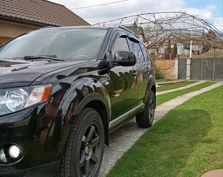 Черный Мицубиси Аутлендер, объемом двигателя 2.35 л и пробегом 245 тыс. км за 8000 $, фото 22 на Automoto.ua