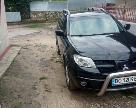 Чорний Міцубісі Аутлендер, об'ємом двигуна 2 л та пробігом 208 тис. км за 6700 $, фото 10 на Automoto.ua