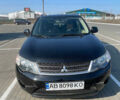 Чорний Міцубісі Аутлендер, об'ємом двигуна 2.4 л та пробігом 195 тис. км за 8600 $, фото 1 на Automoto.ua