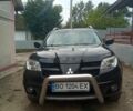 Чорний Міцубісі Аутлендер, об'ємом двигуна 2 л та пробігом 208 тис. км за 6700 $, фото 9 на Automoto.ua