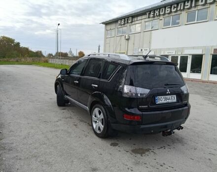 Черный Мицубиси Аутлендер, объемом двигателя 2.2 л и пробегом 200 тыс. км за 9500 $, фото 2 на Automoto.ua