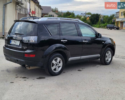 Чорний Міцубісі Аутлендер, об'ємом двигуна 2.4 л та пробігом 205 тис. км за 8400 $, фото 4 на Automoto.ua
