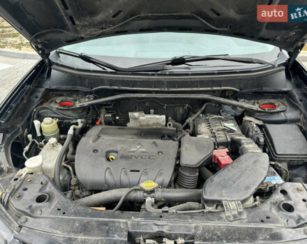 Чорний Міцубісі Аутлендер, об'ємом двигуна 2.4 л та пробігом 218 тис. км за 10000 $, фото 2 на Automoto.ua