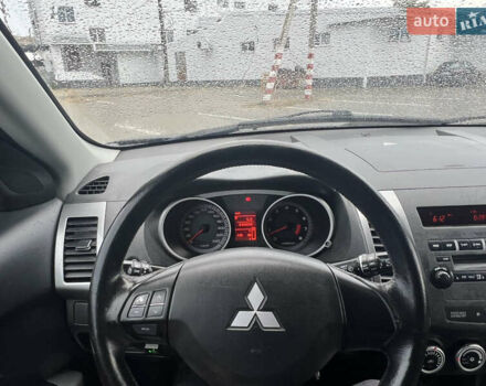 Мицубиси Аутлендер 2008 в Кременчуге на Automoto.ua Черный Мицубиси Аутлендер, объемом двигателя 2.4 л и пробегом 230 тыс. км за 6850 $, фото 29 на Automoto.ua