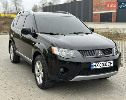 Черный Мицубиси Аутлендер, объемом двигателя 3 л и пробегом 248 тыс. км за 9800 $, фото 2 на Automoto.ua