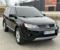 Черный Мицубиси Аутлендер, объемом двигателя 3 л и пробегом 248 тыс. км за 9800 $, фото 2 на Automoto.ua