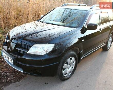 Черный Мицубиси Аутлендер, объемом двигателя 2 л и пробегом 189 тыс. км за 7200 $, фото 28 на Automoto.ua