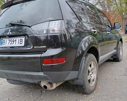 Чорний Міцубісі Аутлендер, об'ємом двигуна 2.36 л та пробігом 265 тис. км за 8800 $, фото 18 на Automoto.ua