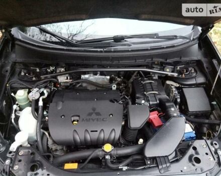 Чорний Міцубісі Аутлендер, об'ємом двигуна 2.4 л та пробігом 171 тис. км за 9950 $, фото 12 на Automoto.ua