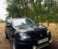 Черный Мицубиси Аутлендер, объемом двигателя 2 л и пробегом 250 тыс. км за 6100 $, фото 1 на Automoto.ua