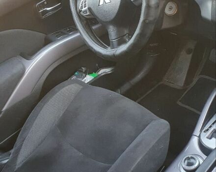 Чорний Міцубісі Аутлендер, об'ємом двигуна 2.4 л та пробігом 325 тис. км за 7500 $, фото 9 на Automoto.ua