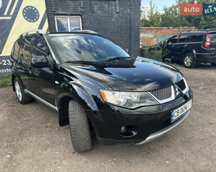 Чорний Міцубісі Аутлендер, об'ємом двигуна 2.36 л та пробігом 251 тис. км за 8999 $, фото 20 на Automoto.ua