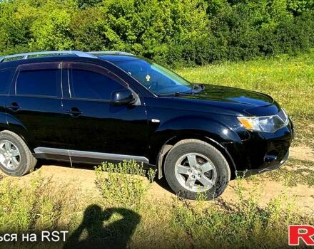 Черный Мицубиси Аутлендер, объемом двигателя 2.4 л и пробегом 217 тыс. км за 7300 $, фото 5 на Automoto.ua