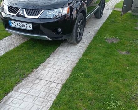 Черный Мицубиси Аутлендер, объемом двигателя 2.35 л и пробегом 245 тыс. км за 8000 $, фото 26 на Automoto.ua