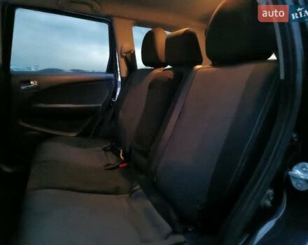 Чорний Міцубісі Аутлендер, об'ємом двигуна 2 л та пробігом 271 тис. км за 6940 $, фото 32 на Automoto.ua